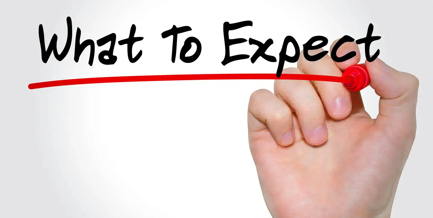 What to expect text being written with a red marker