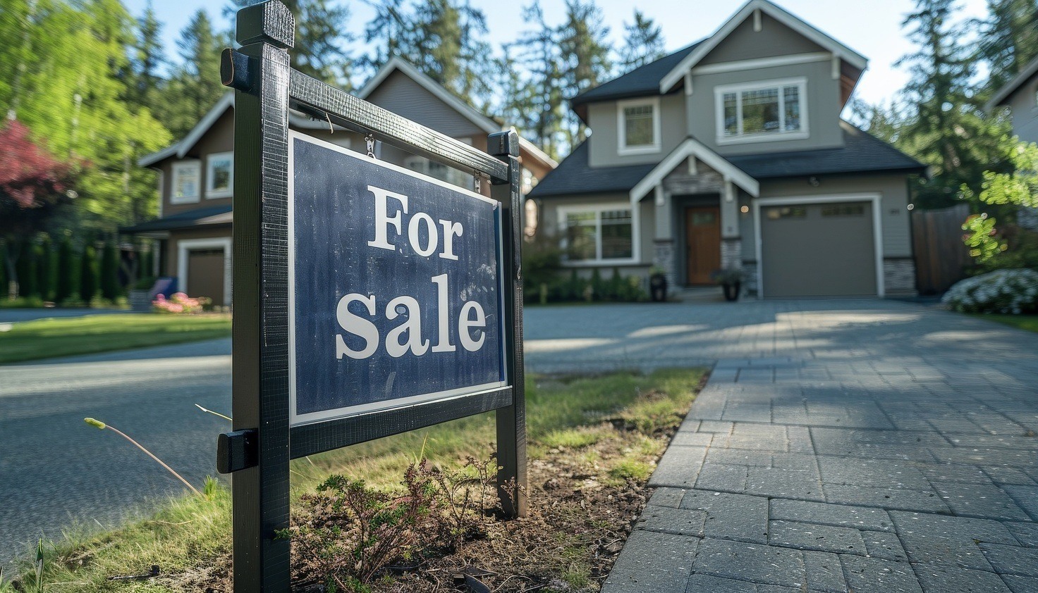 Upgraded home with a 'For Sale' sign in the yard, showcasing curb appeal and preparation for a successful home sale.