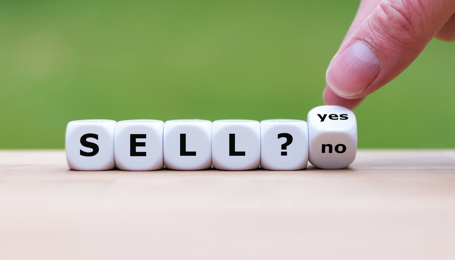 Dice spelling 'Sell?' with a final roll between 'Yes' and 'No' — symbolizing the uncertainty of deciding when to sell a house.